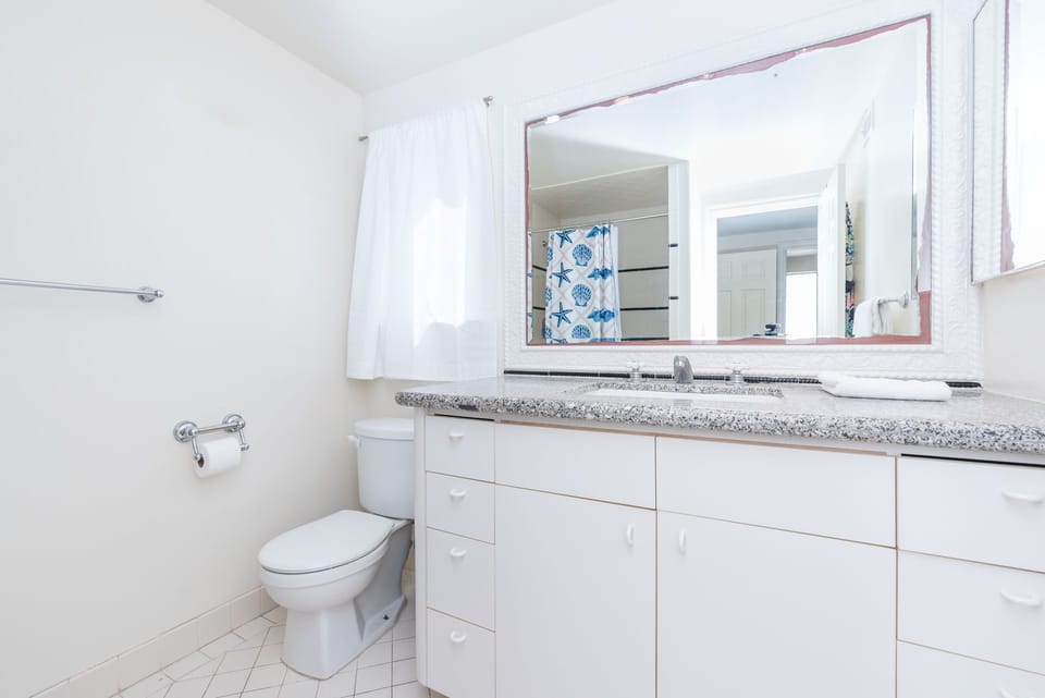 Start your day refreshed in the primary bathroom.
                