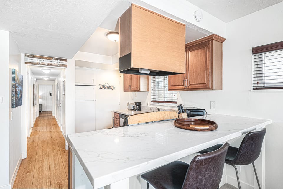 Casual breakfast bar for two, perfect for sipping morning coffee
                