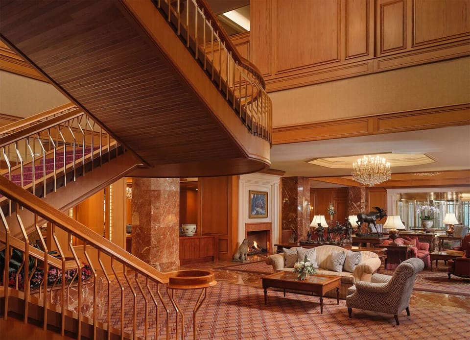 Step into a grand lobby lounge with timeless warmth.