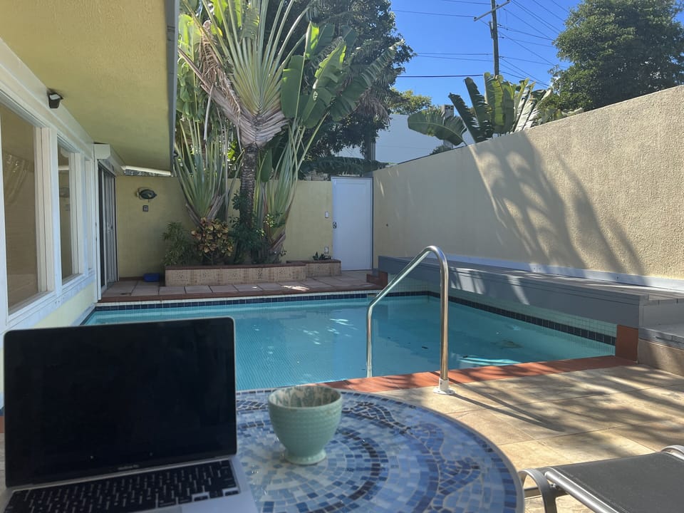 Catch up on email by the pool.


