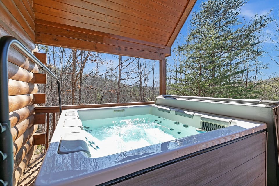 Soak your worries and stress away in the hot tub located right off the living space on the main level.