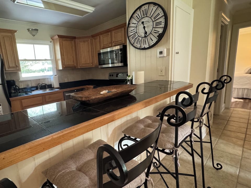 Bar
Four Bar Stools
Lots of comfortable  dining