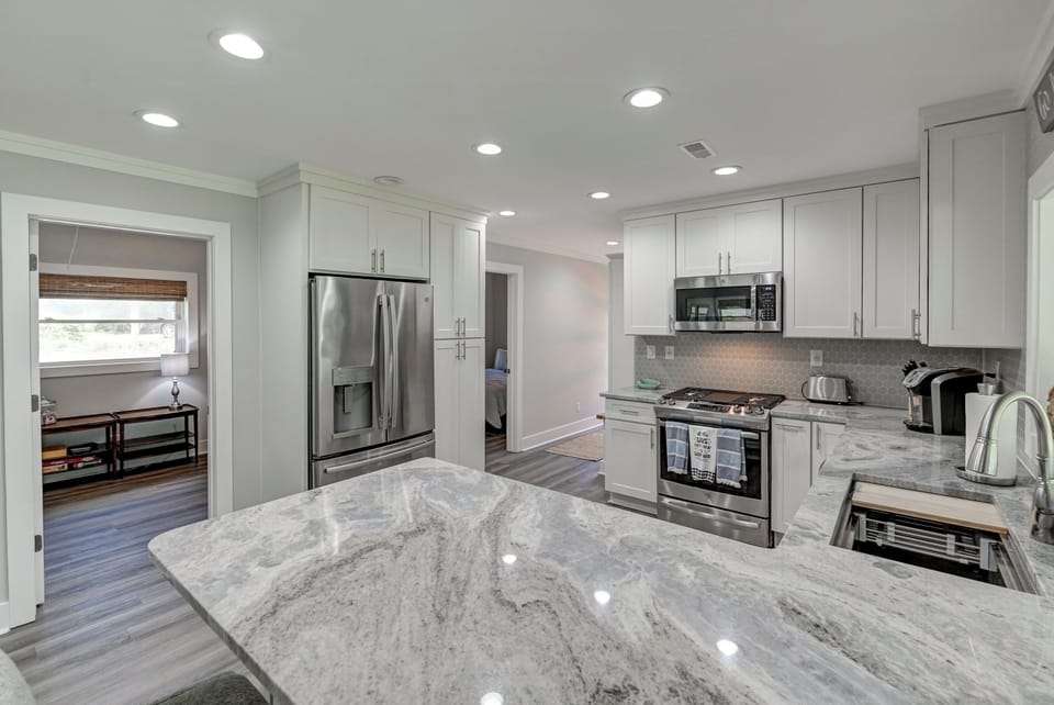 Modern kitchen that is fully stocked! 