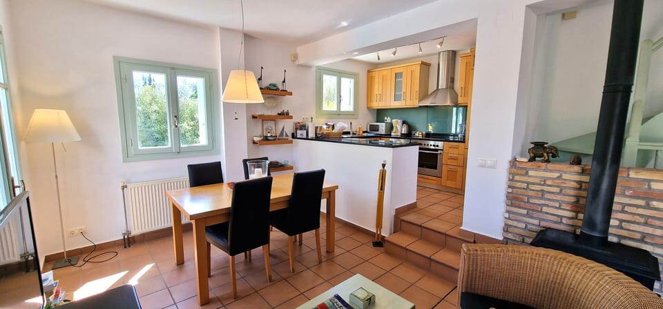 equipped with smart TV, a wood burning stove