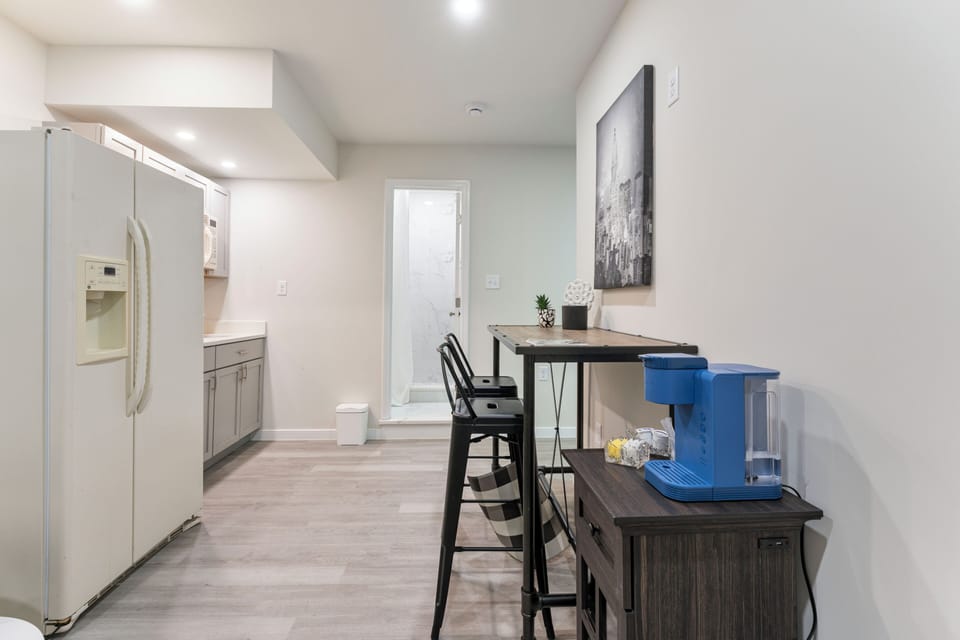 kitchenette, living area featuring coffee maker for breakfast