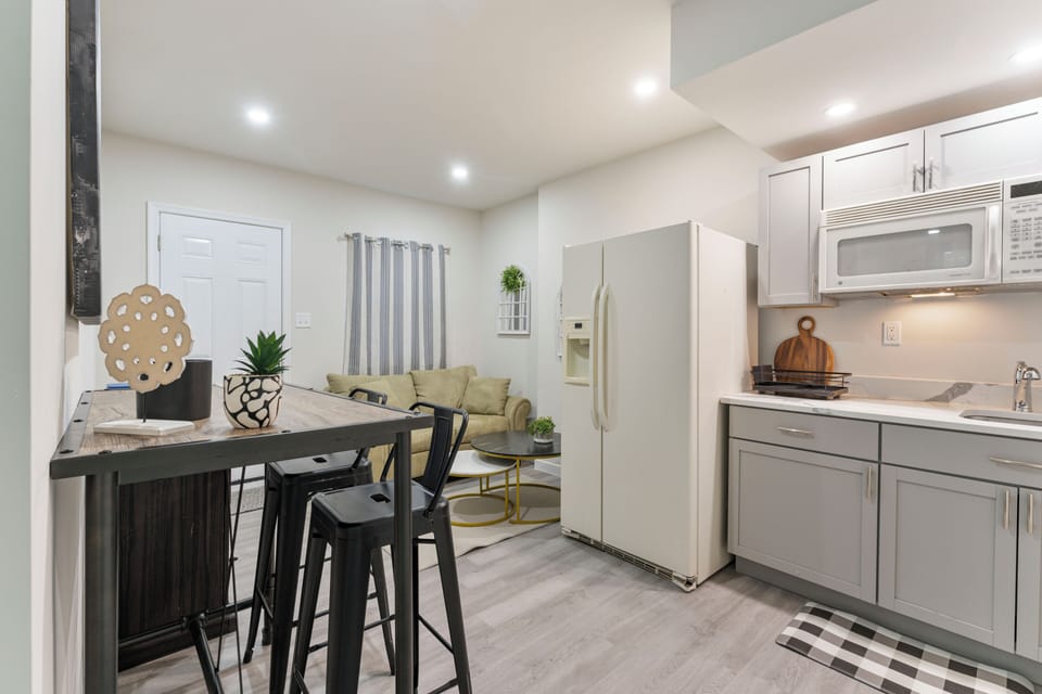 intimate table for two in this living area, ideal for dining or unwinding