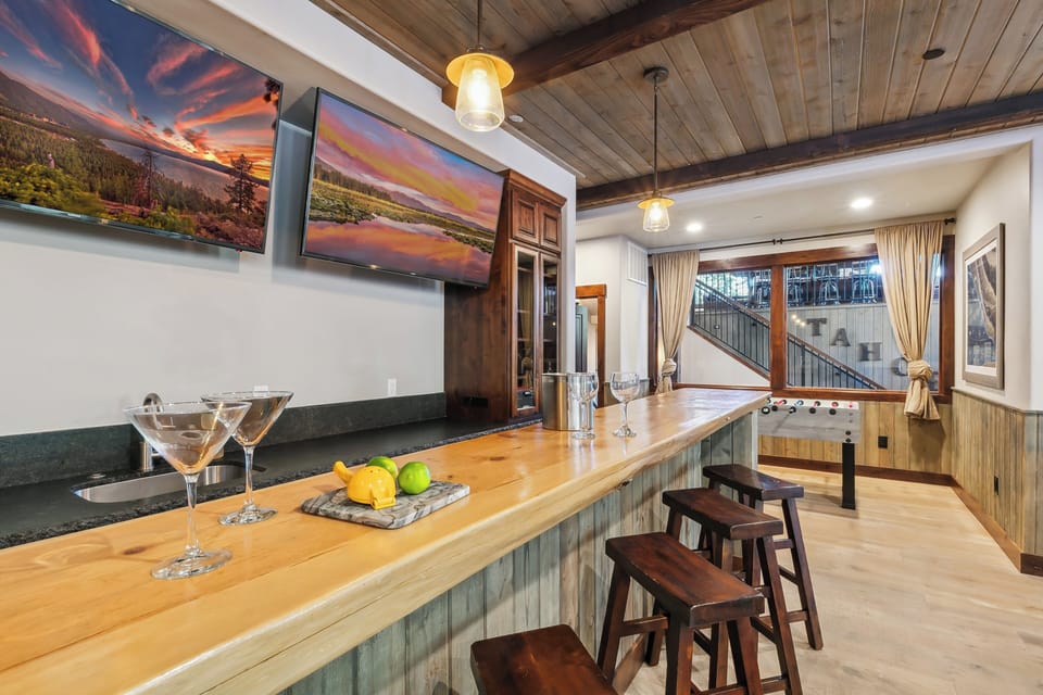 Lounge seating and 8 barstools, complemented by a Yamaha stereo system.