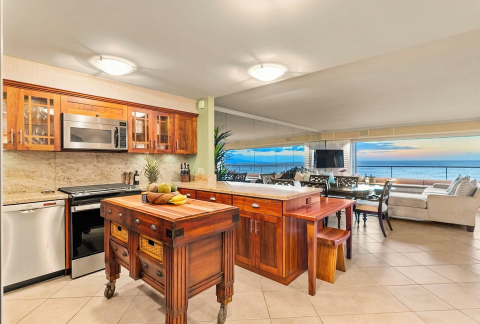 Featuring modern appliances and a prep island.