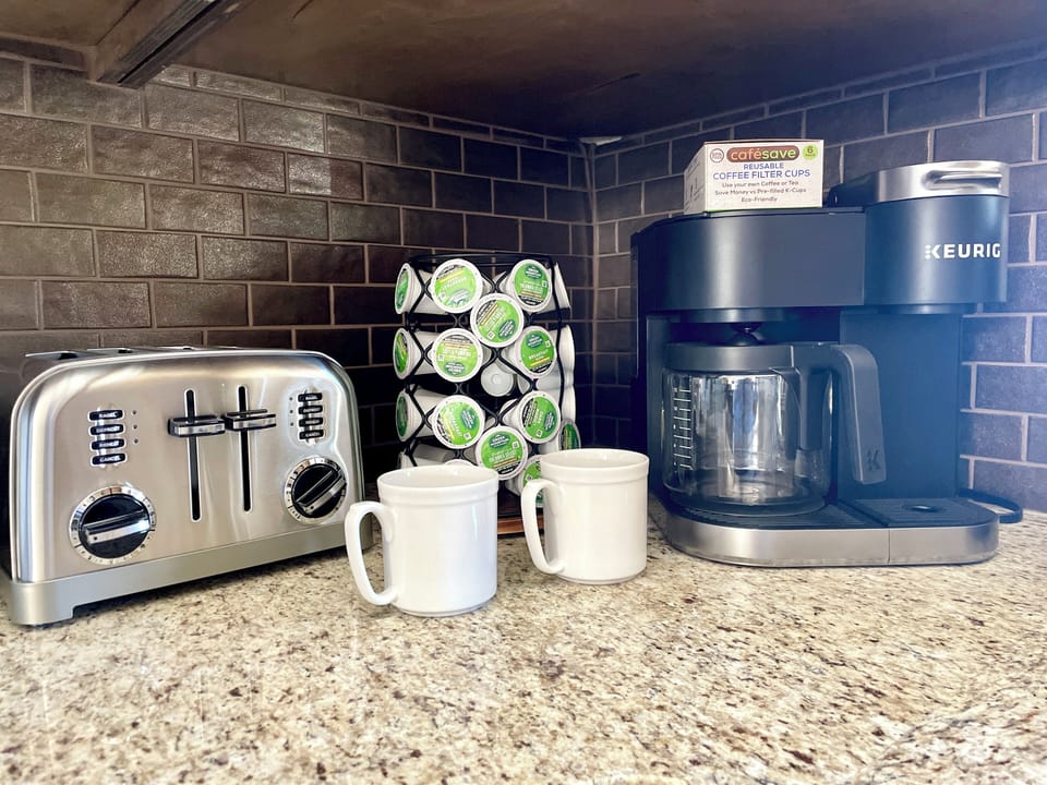 Fuel your day with the perfect cup! Brew your favorite ground coffee or pick a K-Cup for a quick caffeine fix. Sugars, sweeteners, teas and hot chocolate are located in the pantry.  