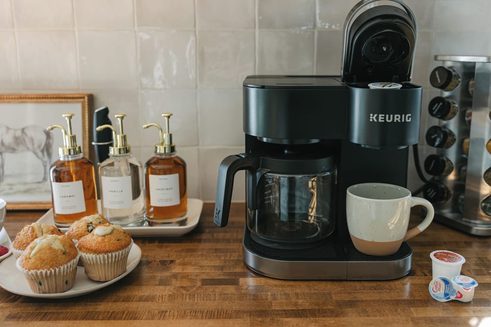 Enjoy host-provided drip- and Keurig coffee with flavored syrup.