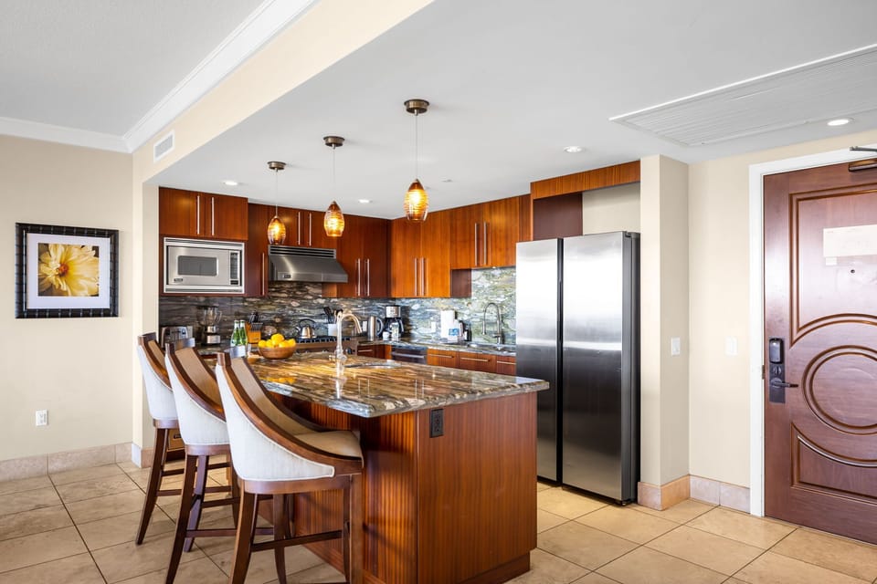 Dining area comfortably seats six and connects seamlessly with the fully equipped kitchen.