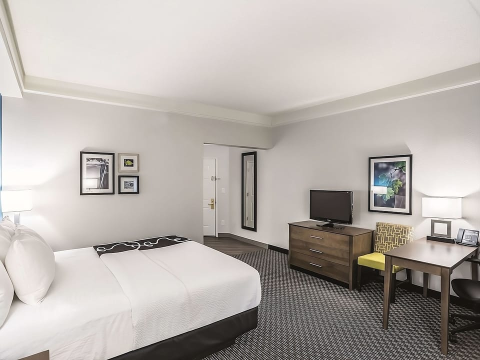 Settle in with a roomy layout, desk, and easy TV nights.