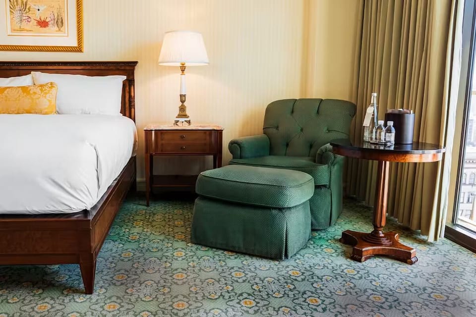 Sink into the cozy armchair and savor a quiet evening drink.