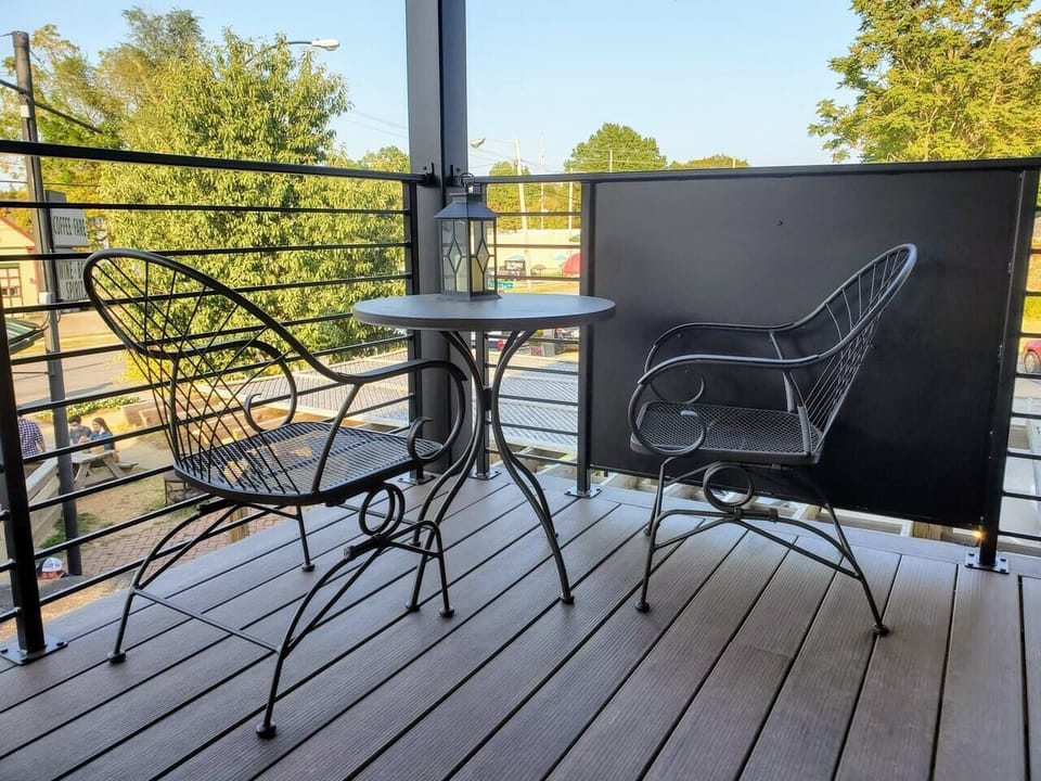 Private Deck Space above shared patio below. 