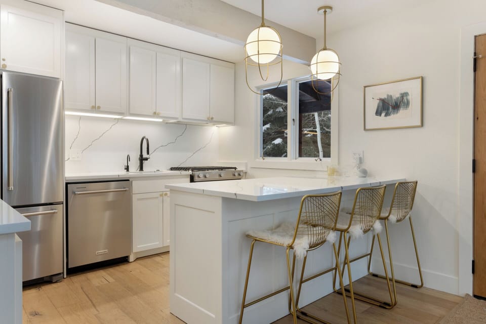 Bar seating for 3 with designer lighting