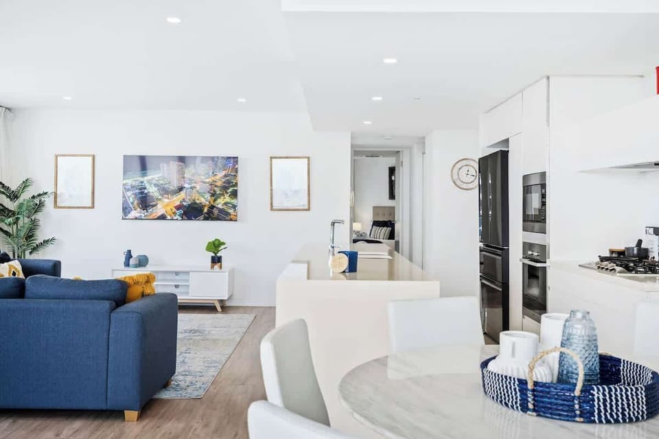Open plan living, dining, and kitchen for a seamless entertaining experience.