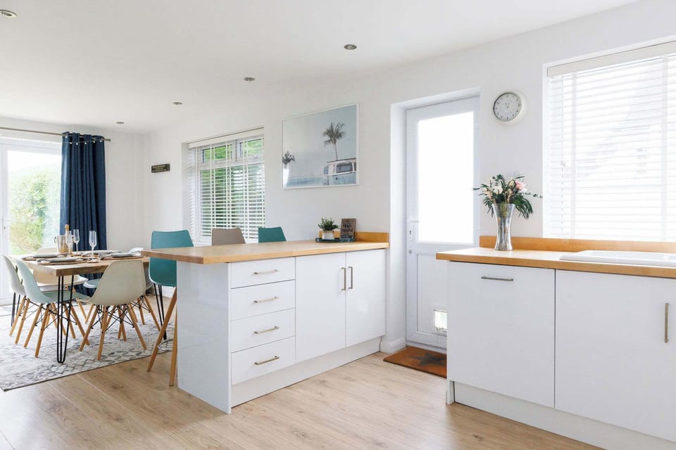 The open plan kitchen and dining space is sure to be the hub of the home, with plenty of space for cooking, eating and catching up with loved ones. 