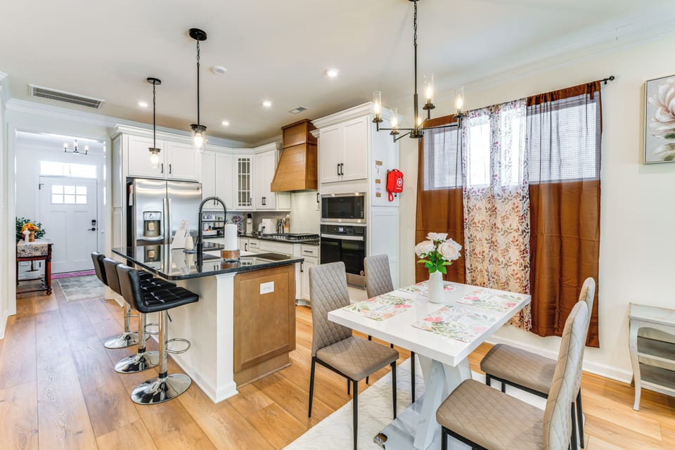 Dining Room & Kitchen | 1st Floor | 2-Story Home