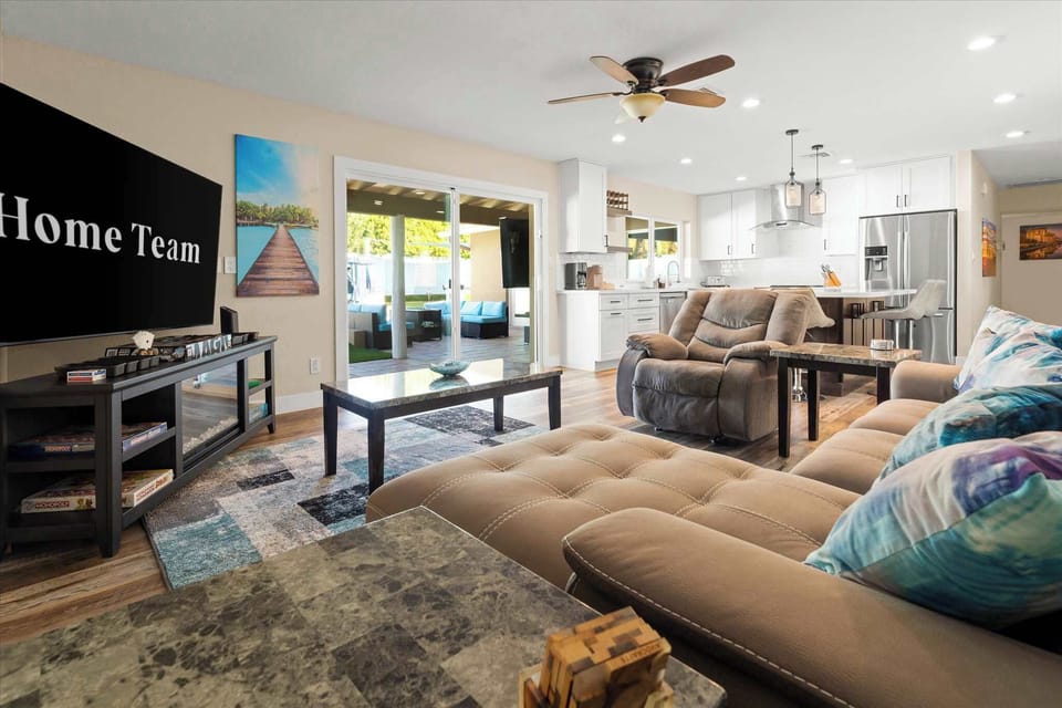 Seamlessly blending indoor and outdoor living, our open floor plan connects the kitchen, living room, and backyard for the ultimate flow.