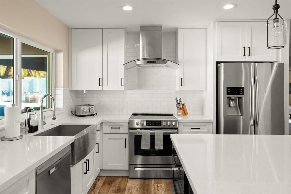 Complete with ample cabinetry and high-end appliances.