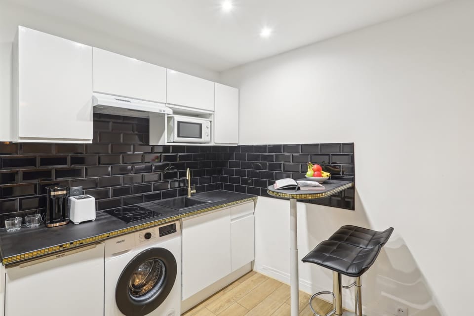 The kitchen is fully equipped to prepare a simple meal 