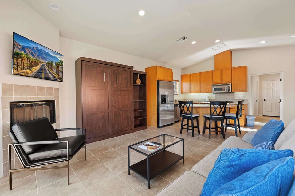 Living space with murphy bed, and Smart TV