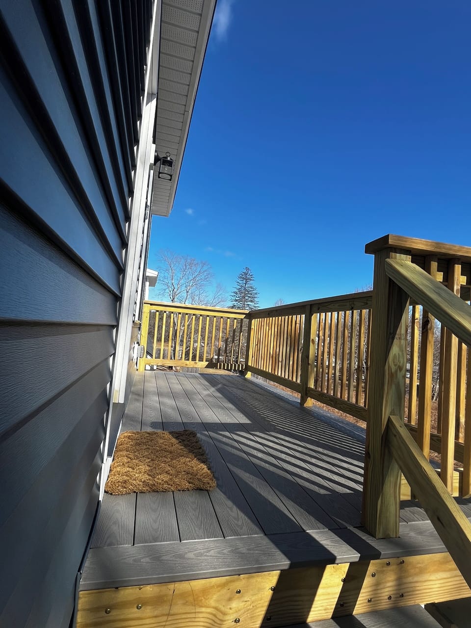 Spacious back deck, perfect for relaxing or enjoying the outdoors.