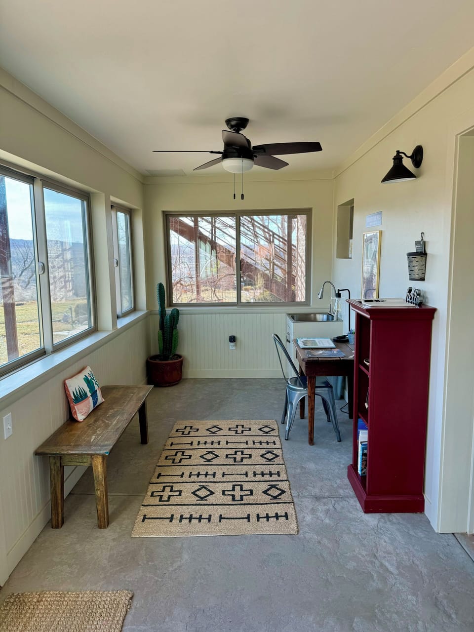 Sunroom with desk.