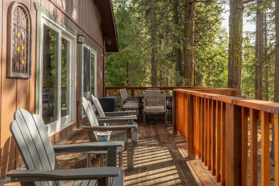 Outside deck space with a gas Weber grill.