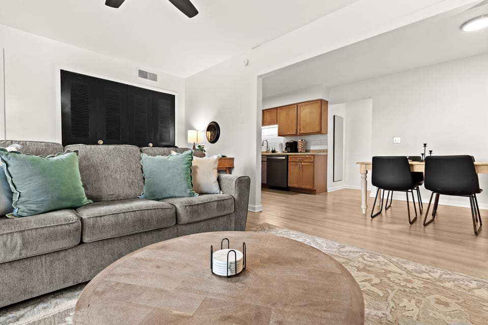 The bright, open living area is perfect for relaxing with family or winding down with a movie.
