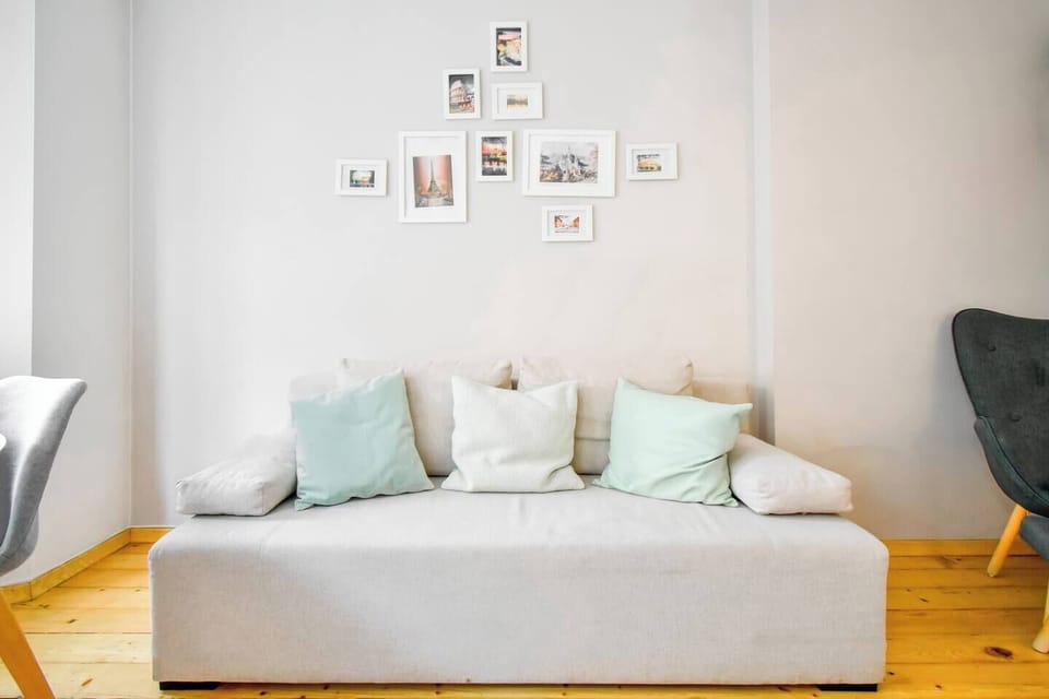 Lounge in comfort on the plush sofa, surrounded by elegant decor and plenty of space to unwind.