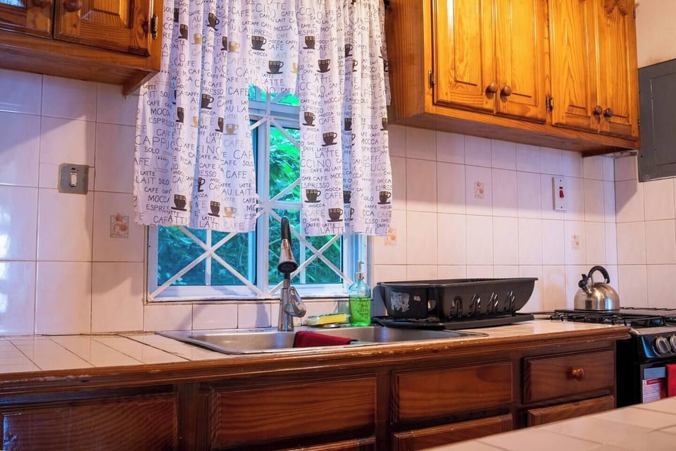 Stocked kitchen with plenty of pots and other cookware. Full size stove and refrigerator, water heater and generator for ultimate comfort and protection against the occasional power outages
