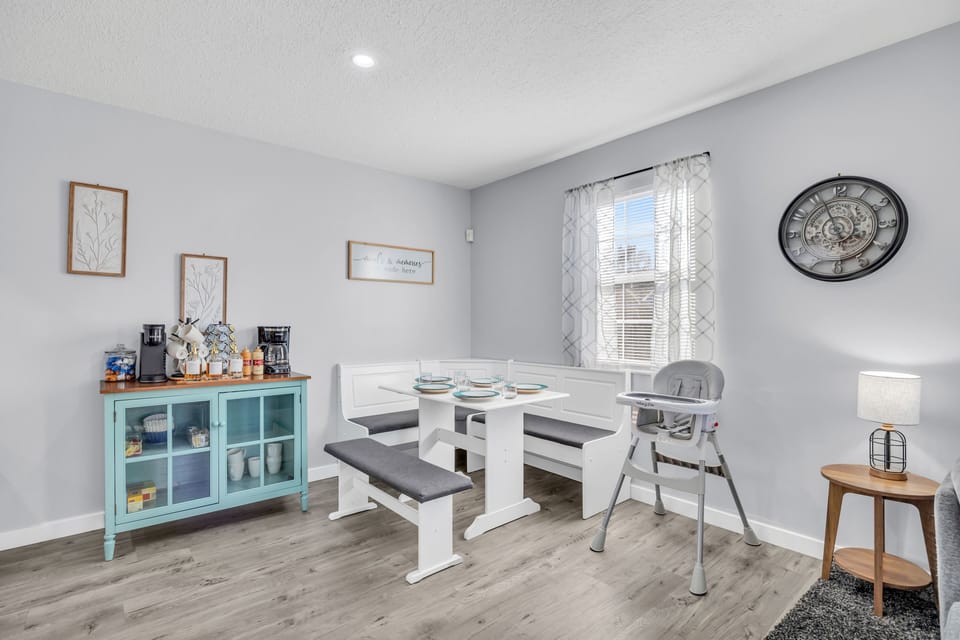 Coffee bar and dining area opens to kitchen and living room