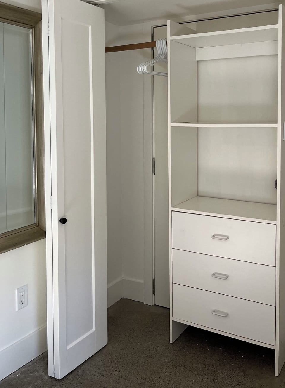 Closet with drawers, shelves and hangers