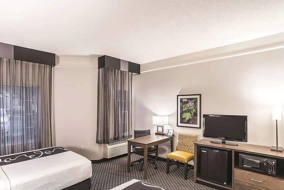 Enjoy snacks anytime with in-room microwave and mini fridge.