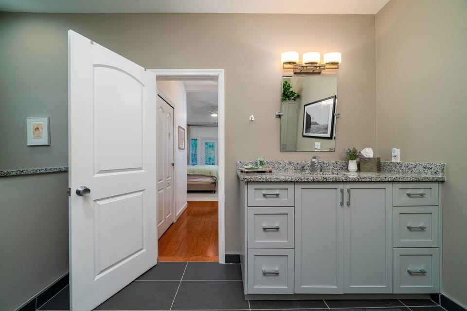 The primary bath has separate vanities