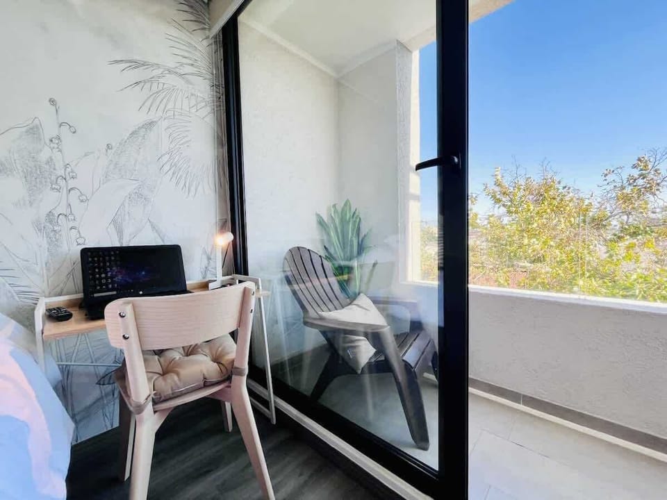 Light-filled nook w/ chair seating & large window views