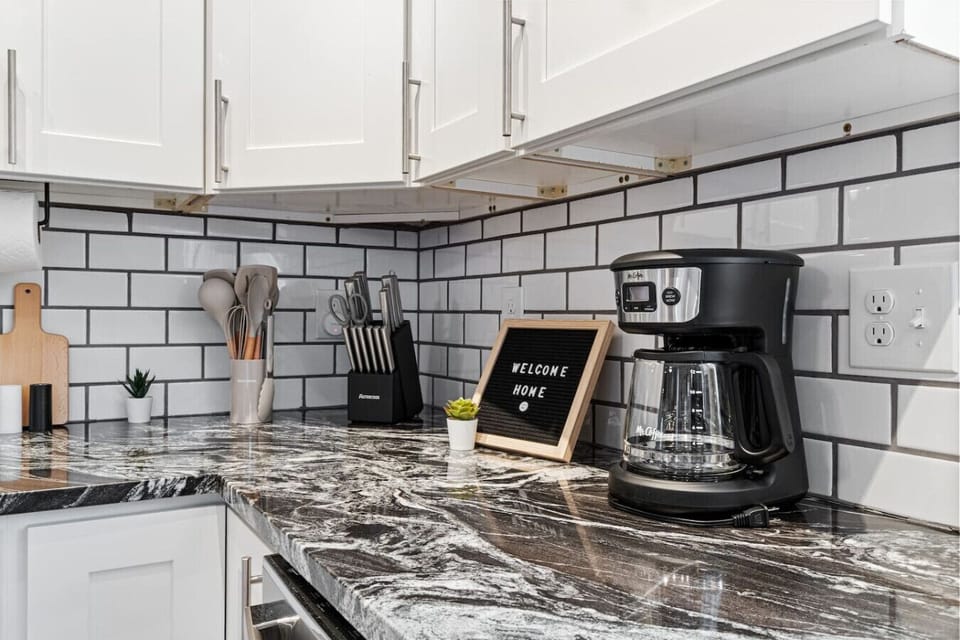 Fully equipped kitchen with all the tools you need for a perfect culinary experience. Enjoy the convenience of having everything at your fingertips!