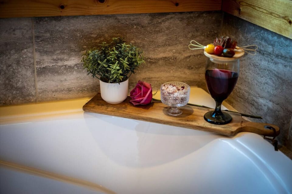 Treat yourself to a quiet evening with a glass of wine, gourmet bites, and a soothing soak. This cozy corner is made for slowing down and savoring the moment.