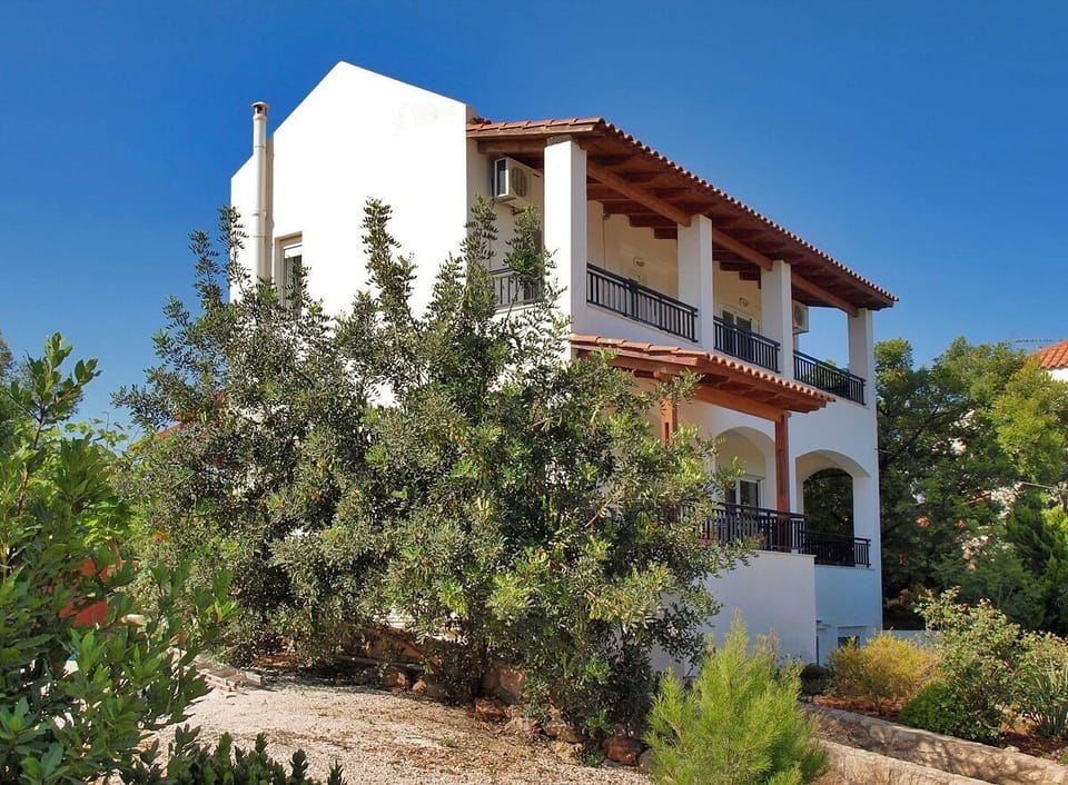 Enjoy a private hilltop, surrounded by mature trees, herbs and flowering shrubs.