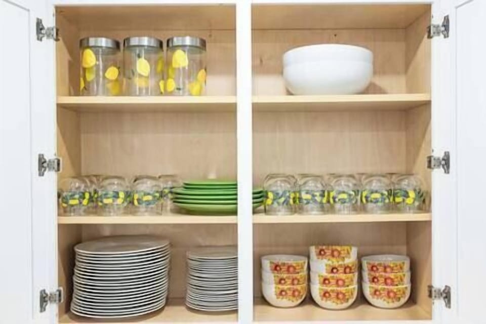 Stylish plates, bowls, and glasses set, perfect for serving meals in style and comfort.