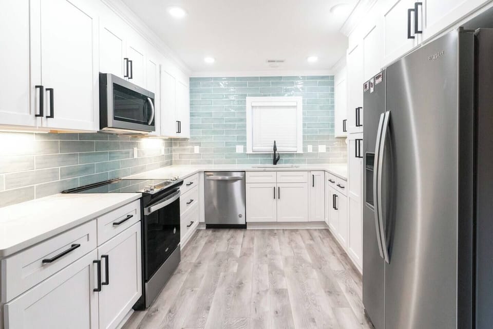 Fully equipped kitchen with all the essentials for cooking and meal prep during your stay.