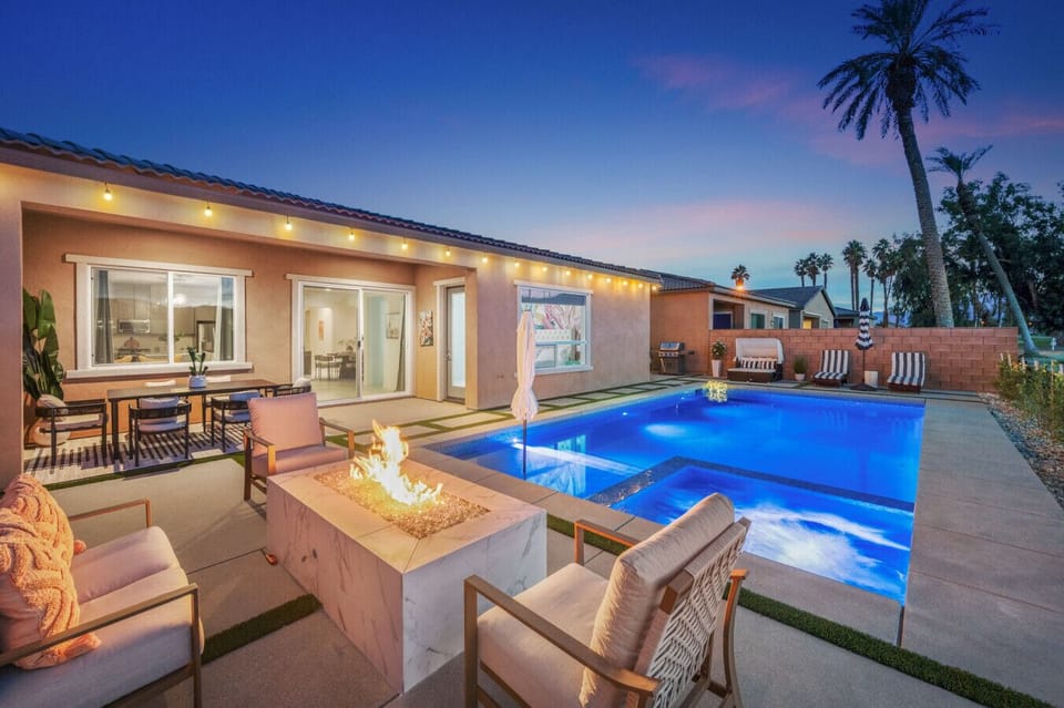 Backyard retreat w/ pool, firepit lounge & covered patio for seamless indoor-outdoor living