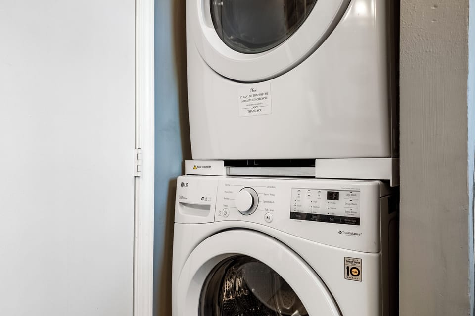 Stacked washer and dryer.