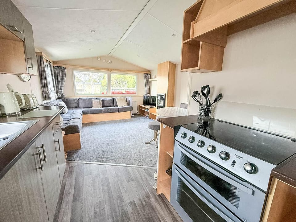 Bright, open kitchen and living area with cozy seating