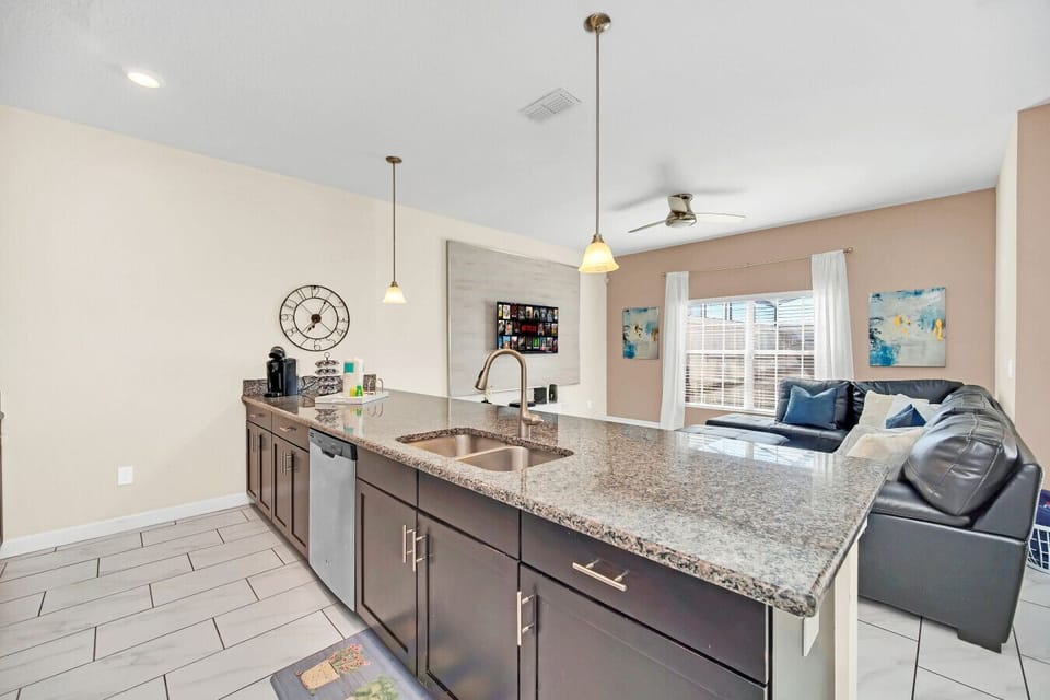 Spacious kitchen with modern appliances.
