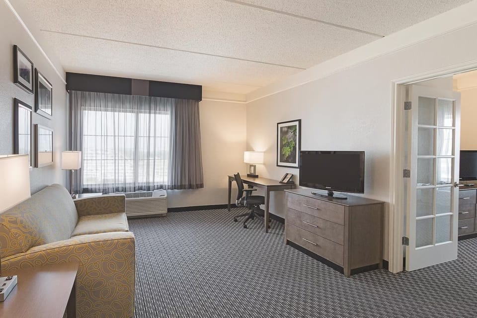 Stretch out on the sofa in your spacious, sunlit suite.