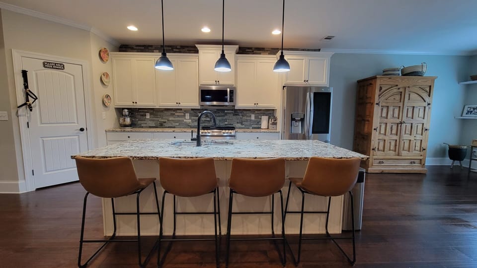 Kitchen and partial view of office