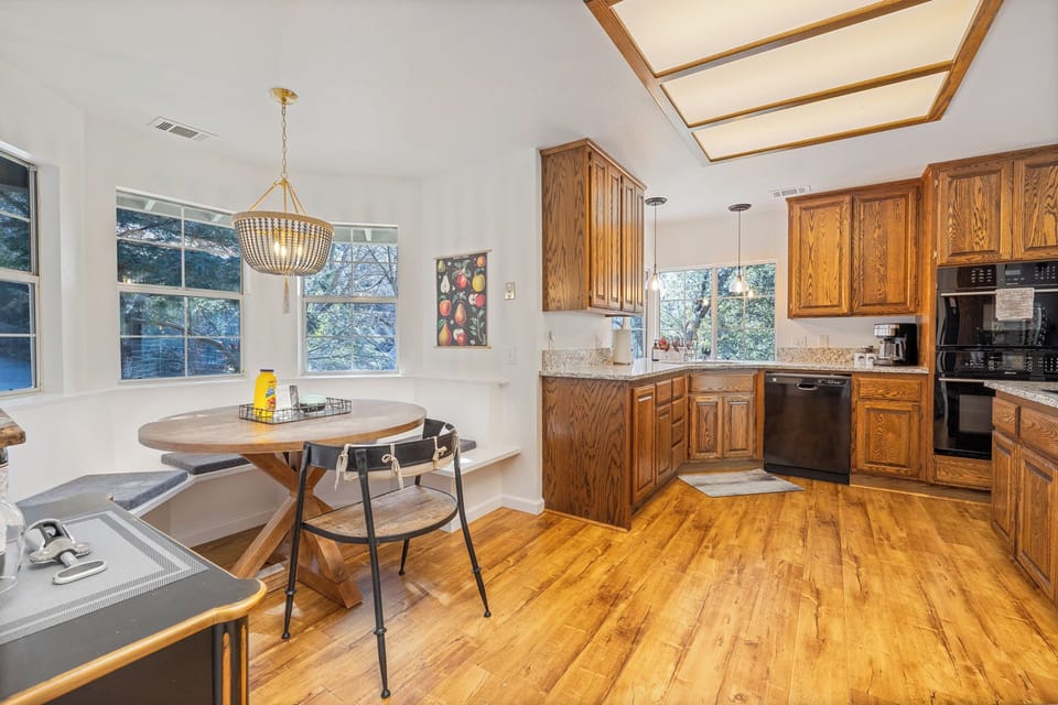 Spacious fully stocked kitchen with dining nook.