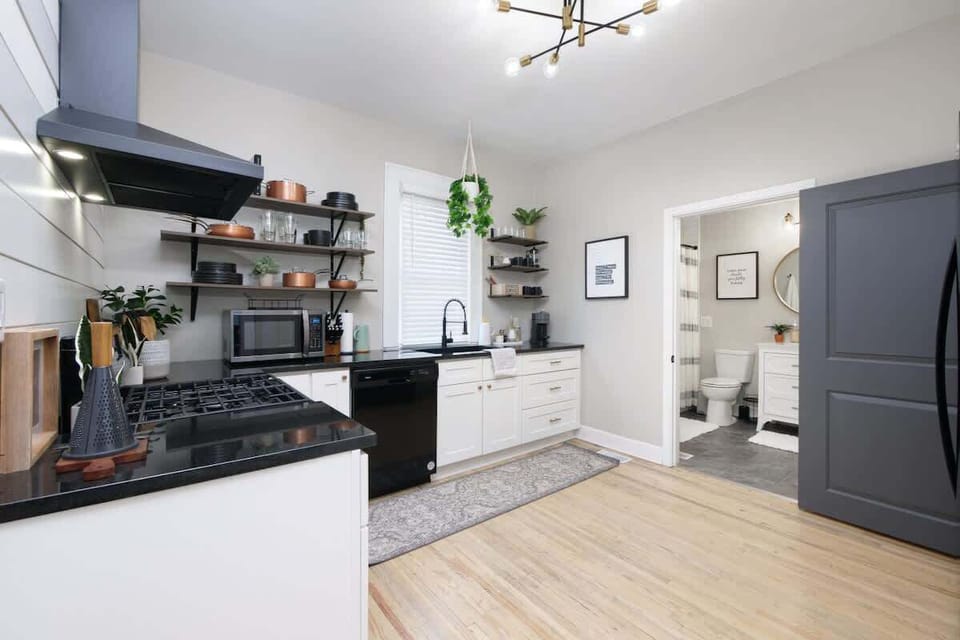 Bright kitchen w/ sleek finishes, ample counter space & room to cook comfortably
